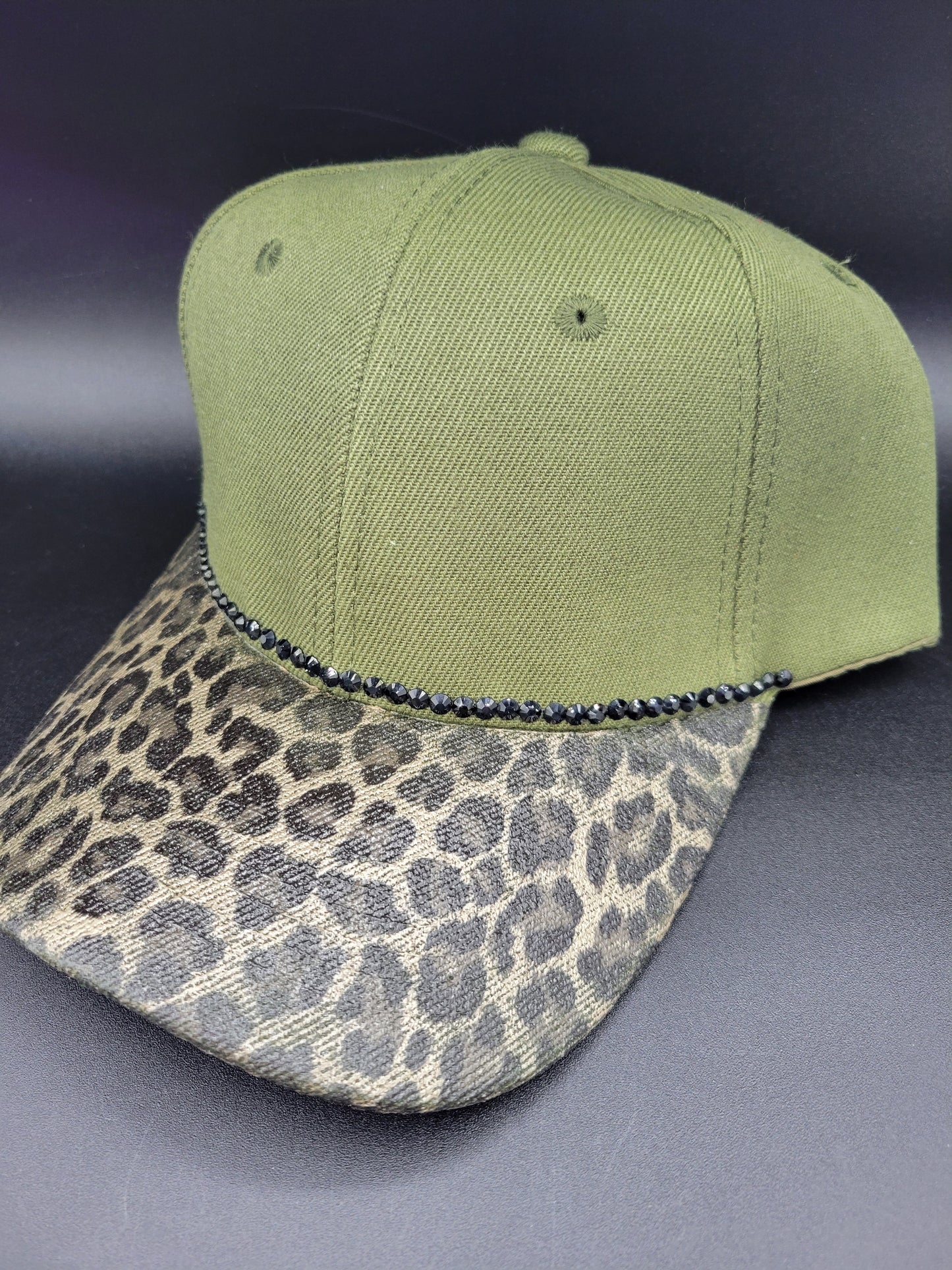 Olive green dad cap with gold leopard foil and black rhinestones