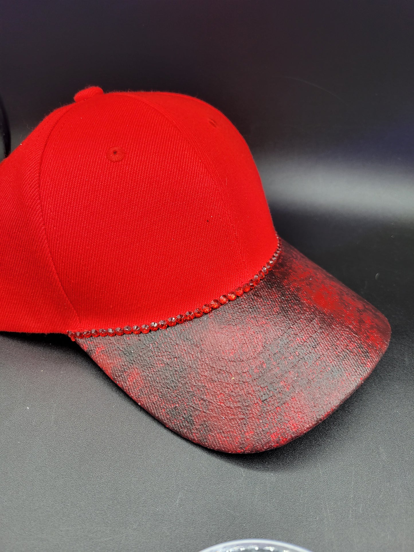 Red dad cap with black and red foil and red rhinestones